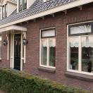 Huis met drie dezelfde dakkapellen - 3