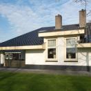 Wit huis met beige kozijnen - 7