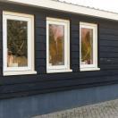 Wit huis met beige kozijnen - 8