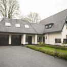 Wit huis met zwarte kozijnen - 3